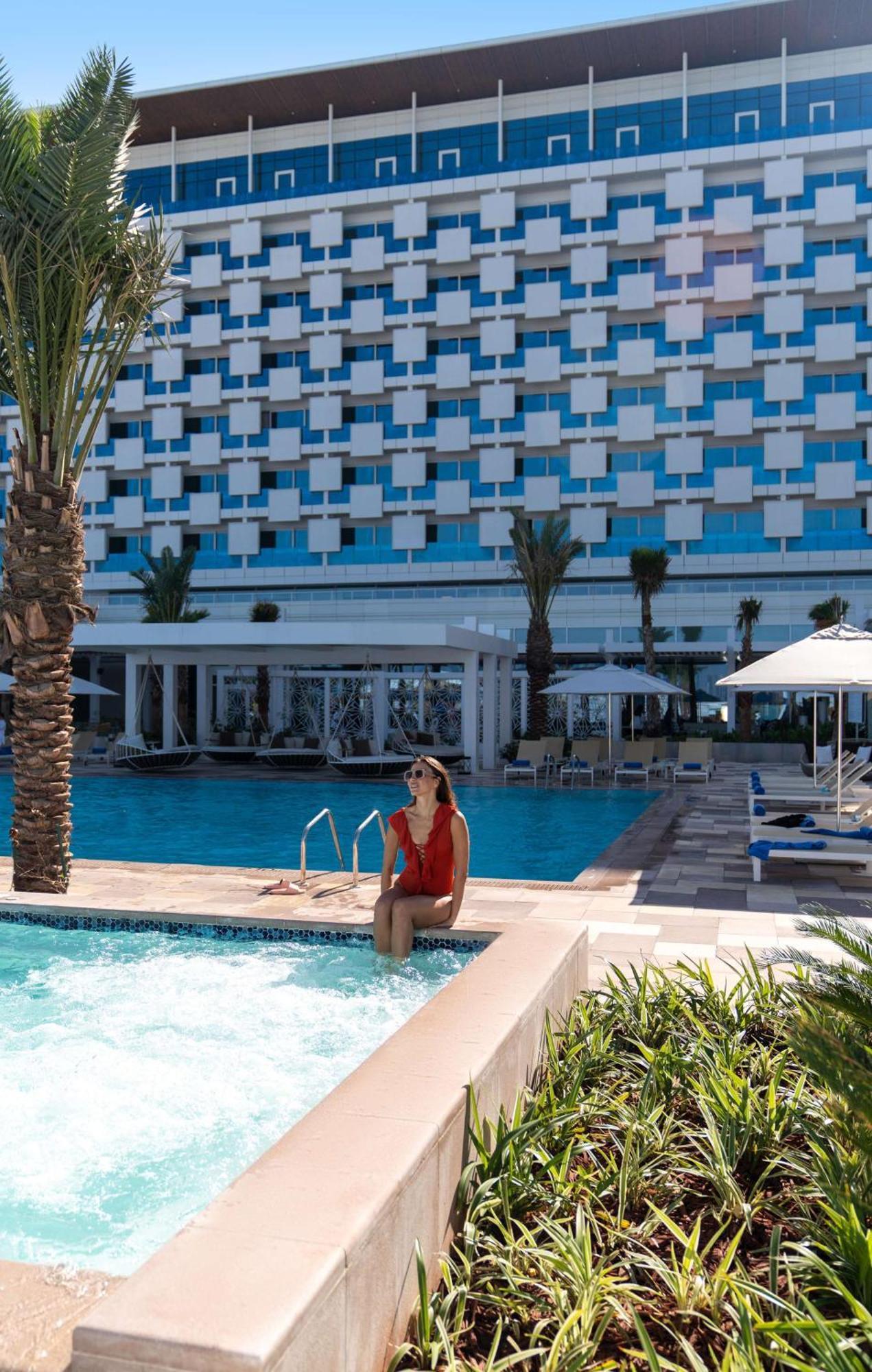 Rixos Gulf Hotel Doha Exterior photo The swimming pool at the Hilton Sharm El Sheikh