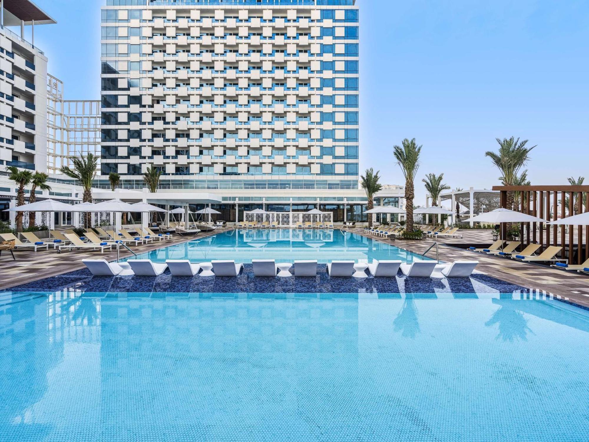 Rixos Gulf Hotel Doha Exterior photo The pool at the hotel