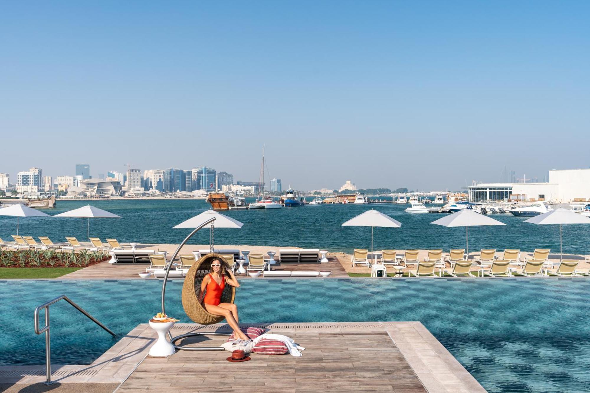 Rixos Gulf Hotel Doha Exterior photo View of the Dubai Marina skyline from the Westin